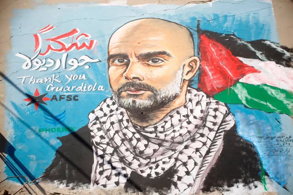 *هيئة خدمات الأصدقاء الأمريكية وشركة فينيكس تنجزان جداريتين للمدرب جوارديولا والنجم لامين يامال في غزة تقديرًا لمواقفهما الداعمة لفلسطين*