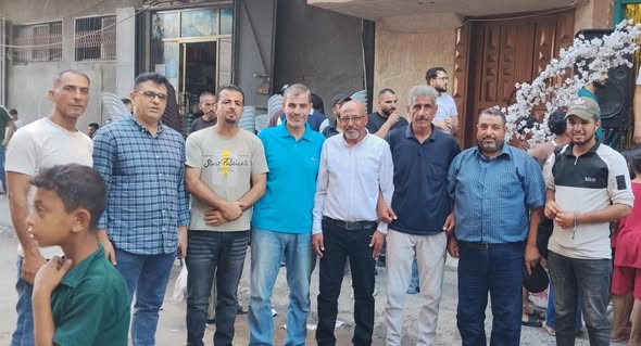 إدارة المخيم المصري 17 الزهراء تشارك في  فرحة افتتاح محل والكوفي سِنت SCNET